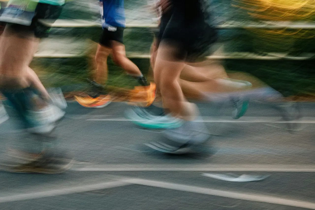 Runners in motion on the road during a race
